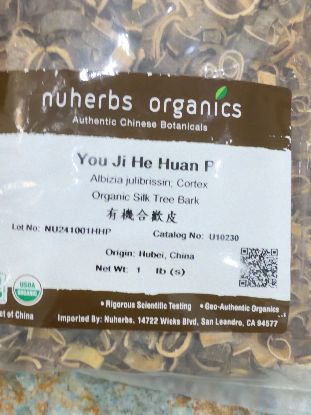 Nuherbs Organics supplier package labeled He Huan Pi, Albizia julibrissin cortex, Organic Silk Tree Bark